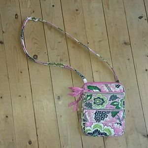A Vera Bradley Purse With A Cute Flower Design